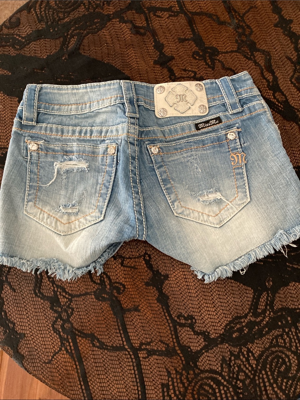 Women’s Miss Me Faded Blue Distressed Denim Cutoff Shorts 26” waist / size 2